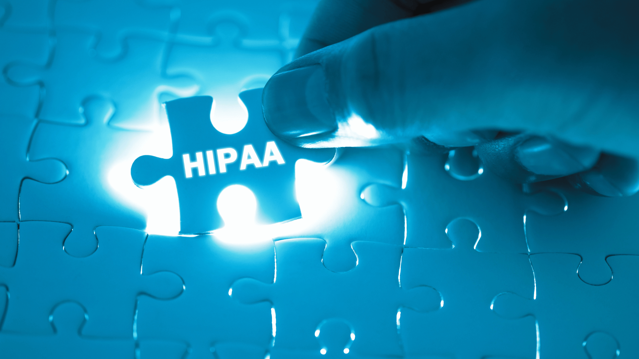 Glowing puzzle pieces with last piece saying "HIPAA"