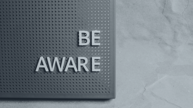 A mat with the words "be aware" on it.